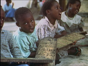 Bambini congolesi apprendono l'arabo